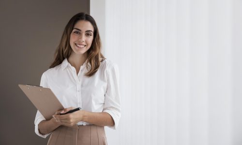 front-view-elegant-businesswoman-holding-clipboard-with-copy-space